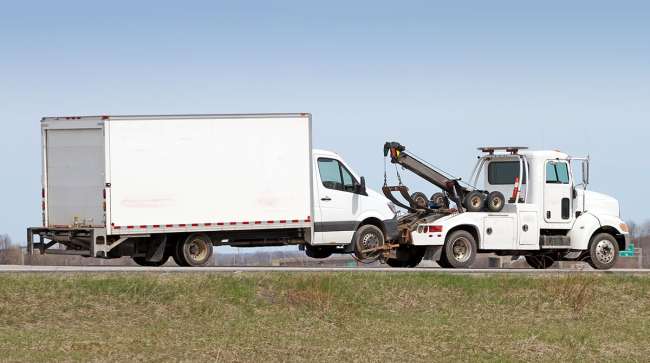 Getty image of truck being towed