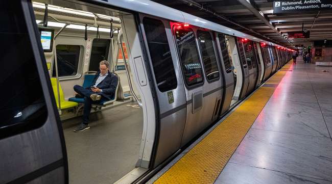 Commuter on a Bay Area Rapid Transit train