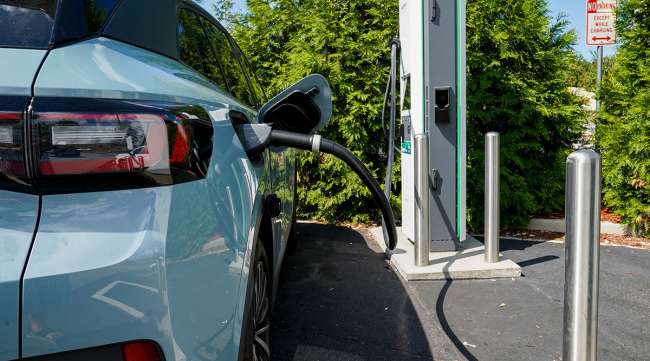 Electric vehicle being charged