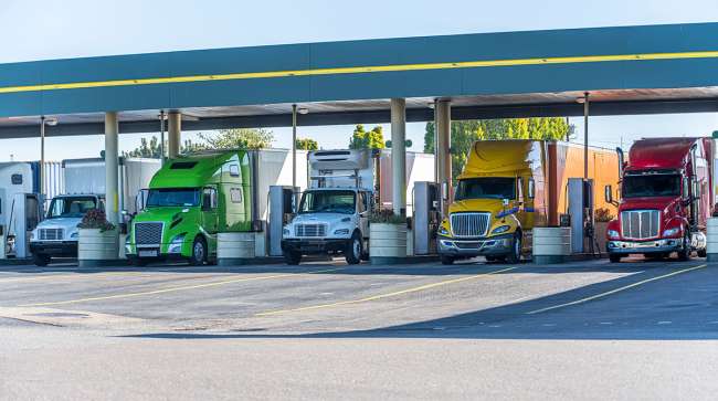 Trucks at a fueling station