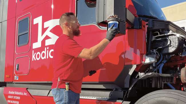 Kodiak technician adjusts lidar