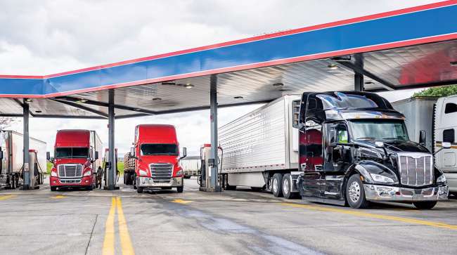 Trucks fueling at a truck stop