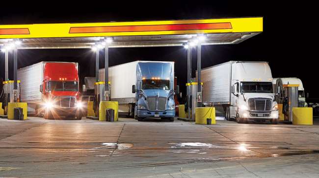 Trucks fueling at a truck stop