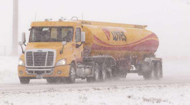 Truck delivers fuel in snow