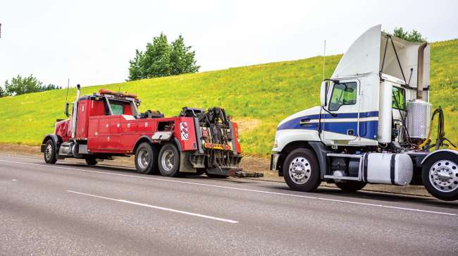 Tow truck and tractor