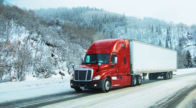 Tractor-trailer on snowy road