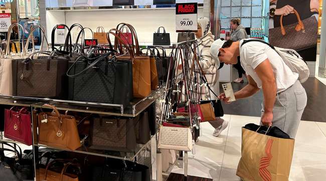 Customers at a Macy's store