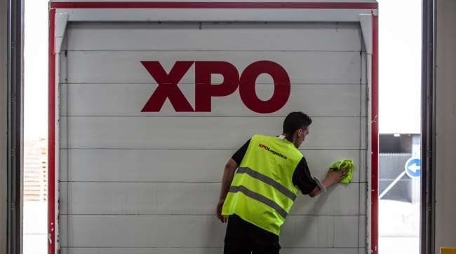 XPO trailer and worker