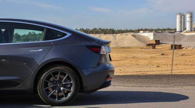 A Tesla Model S vehicle sits parked on a road near the company's Gigafactory building site in Germany in September 2020.