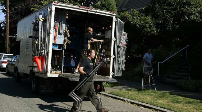 Unloading movie equipment from truck