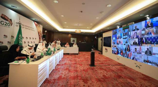 In this photo released by Saudi Energy Ministry, Prince Abdulaziz bin Salman Al-Saud, Minister of Energy of Saudi Arabia, third right, chairs a virtual summit in Saudi Arabia on April 10.