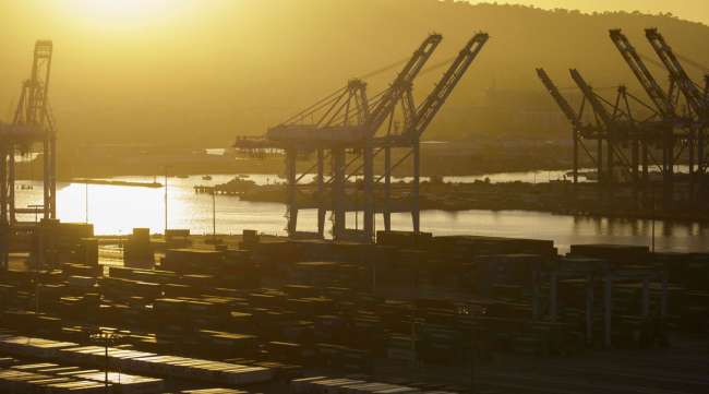 Gantry cranes stand above the Port of Los Angeles.