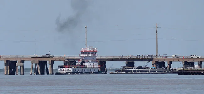 Tugboat near bridge in Galveston, Texas