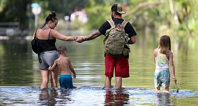 Family in Florida after Hurricane Helene