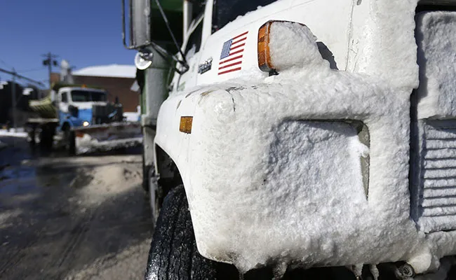 Truck bumper covered with snow