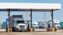 Trucks at a fueling station