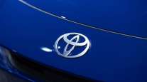 Toyota logo on a Prius plug-in hybrid electric vehicle