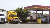 Trucks fueling at a truck stop