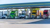 Trucks at a fueling station