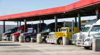 Trucks at a fueling station