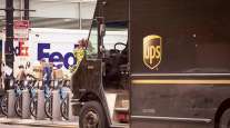 UPS, FedEx trucks