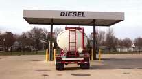 Fuel tanker at filling station