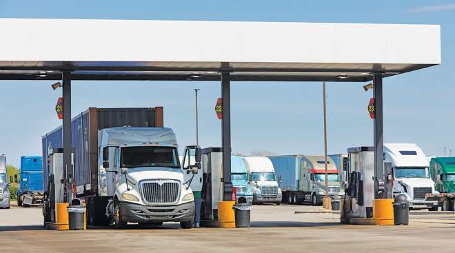 Trucks at a fueling station