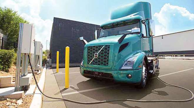 Volvo electric truck at charging station