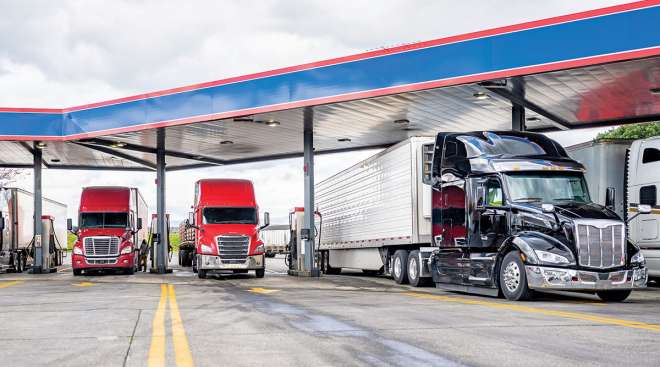 Trucks fueling at a truck stop