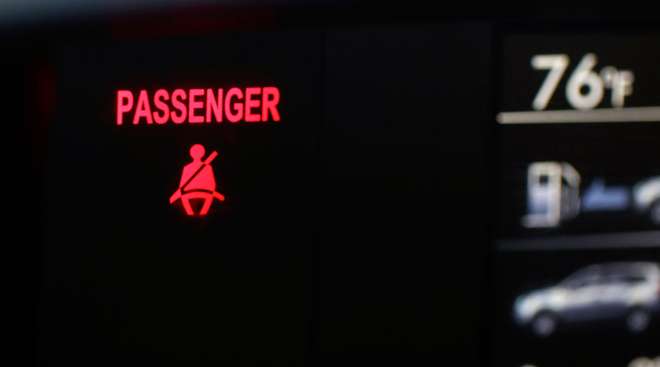 Seat belt warning symbol