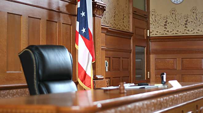 Courtroom scene showing judge's bench by Getty Images