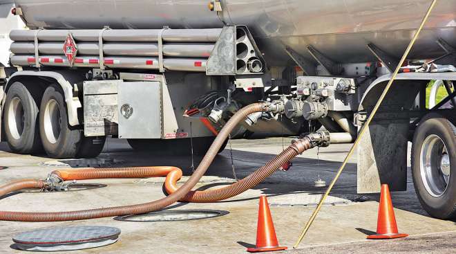 Tanker truck delivering fuel