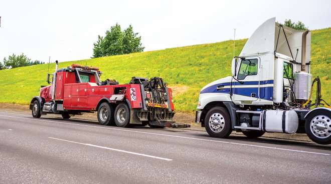 Tow truck and tractor