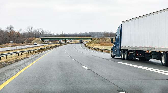 Truck heading toward bridge on New York State Thruway